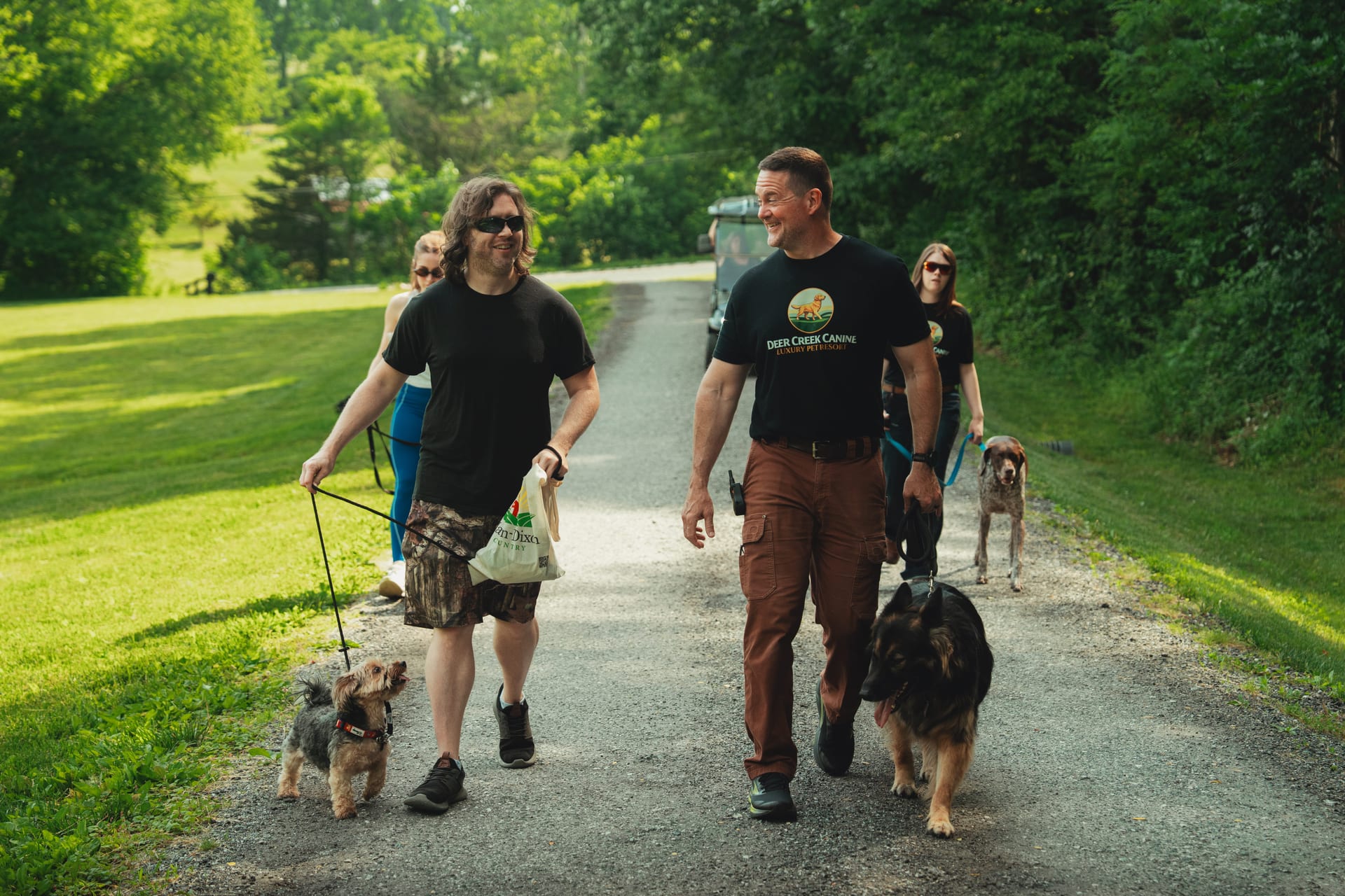 The Deer Creek Canine team on a board-and-train pack walk across the 23-acre property