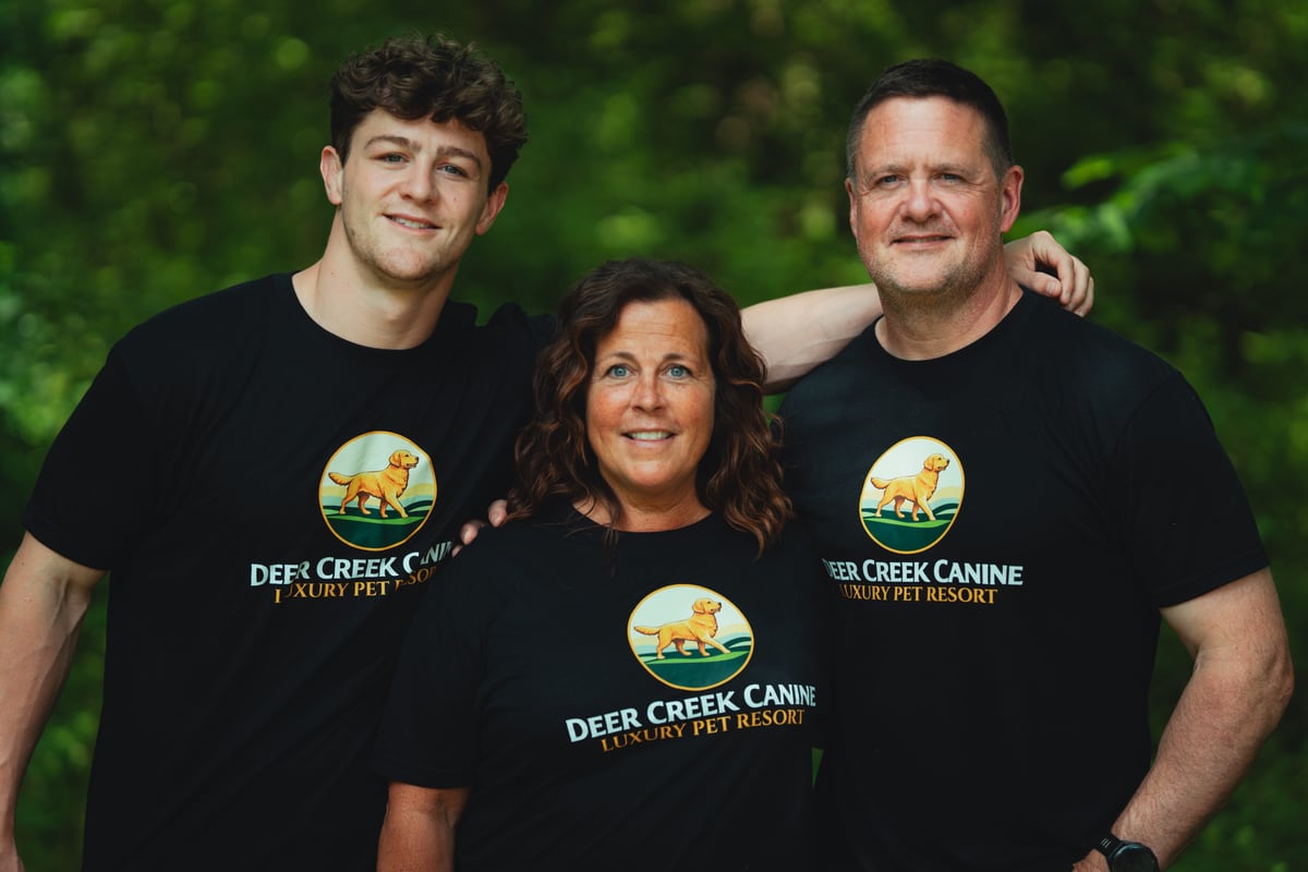 Deer Creek Canine owners Matt and Tracey with their son at the resort